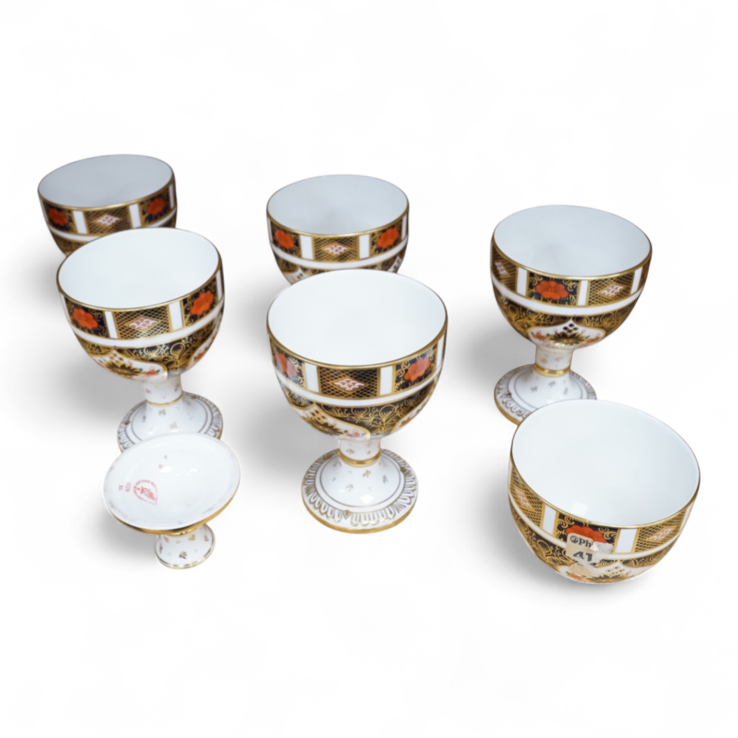 A group of six Royal Crown Derby stemmed cups (one cup and stem detached). 12.5cm high